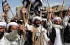 Obama noted the situation is increasingly perilous in Afghanistan. President Obama said he will target Al Qaeda safe havens on both sides of the mountainous border between Afghanistan and Pakistan. Photo; Militants in the border region of Afghanistan.