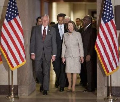 President Barack Obama walks by House Majority Leader Steny Hoyer and House Speaker Nancy Pelosi on Capitol Hill  on the way to a House Democratic Caucus Luncheon on March 30, 2009.