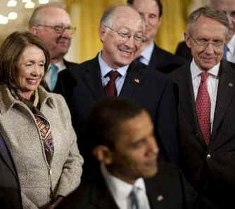 President Barack Obama signs the Omnibus Public Lands Management Act in the East Room of the White House on March 30, 2009. House Speaker Nancy Pelosi and other government officials joined President Obama for the signing.
