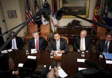 President Barack Obama talks to reporters after meeting with White House Special Envoy for Sudan General Scott Gration in the Roosevelt Room on March 30, 2009.