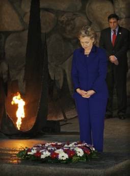 Secretary of State Hillary Clinton lays a wreath at the Yad Vashem Holocaust Hall of Remembrance and wrote a message in the museum guest book. 