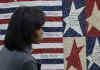 First Lady Michelle Obama visits and speaks at the Arlington National Cemetery for Women in Military Service for America Memorial Center in Arlington, Virginia.
