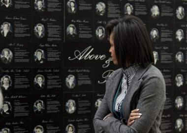 First Lady Michelle Obama visits and speaks at the Arlington National Cemetery for Women in Military Service for America Memorial Center in Arlington, Virginia.