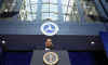 President Barack Obama joins with Vice-President Joe Biden and Transportation Secretary Ray LaHood at the Department of Transport in Washington on March 3, 2009.
