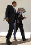 President Obama and PM Gordon Brown walk down the Colonnade to have a working lunch in the Old Family Dining Room.