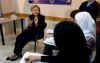 Secretary of State Hillary Clinton meets with students at the English Access Microscholarship program in the West Bank town of Ramallah.