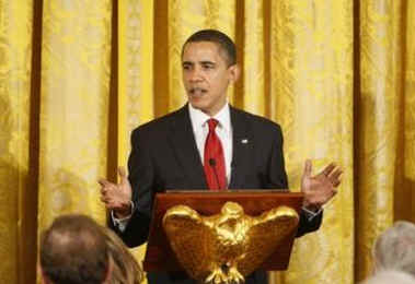 President Barack Obama speaks at a dinner for Congressional Heads in the East Room of the White House on March 4, 2009.