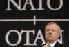 NATO Secretary General Scheffer speaks at a news conference in Brussels.