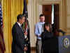 Domestic Policy adviser Melody Barnes and President Obama speak at the start of a White House conference on Health Care Reform.