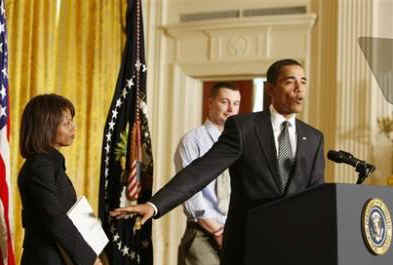 Domestic Policy adviser Melody Barnes and President Obama speak at the start of a White House conference on Health Care Reform.