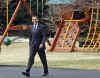 President Barack Obama leaves the White House and passes by the new outdoor play set purchased for Sasha and Malia.