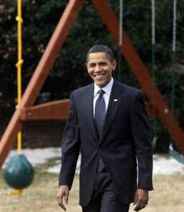 President Barack Obama leaves the White House and passes by the new outdoor play set purchased for Sasha and Malia.