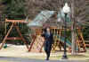 President Barack Obama leaves the White House and passes by the new outdoor play set purchased for Sasha and Malia.