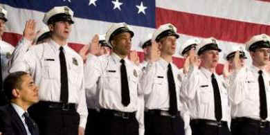 President Barack Obama speaks to the 114th Recruit Class of the Columbus Police Department at the Aladdin Shrine Center in Columbus, Ohio on March 6, 2009. The recruits are an early result of Obama's economic and employment stimulus initiatives.