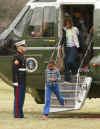 President Barack Obama, First Lady Michelle Obama and Malia Obama return from an overnight stay at Camp David.