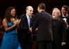 President Obama surprised the audience when he joined entertainers onstage to sing Happy Birthday to Senator Kennedy who attended with his wife Victoria.