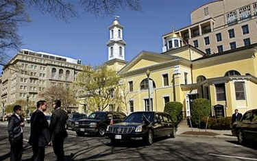 US Secret Service agents wait outside St.John's Church where the Obamas are attending an Easter Service.