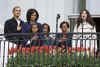 The singer Fergie sang the national anthem and entertained the crowd. President Barack Obama and First Lady Michelle Obama speak to a crowd of about 3,000 from the Truman Balcony at the White House.