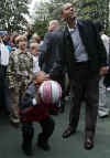 President Barack Obama took some time away from the traditional White House Easter Egg Roll to throw a few basketball hoops with the Easter Monday crowd on the White House grounds on April 13, 2009. 