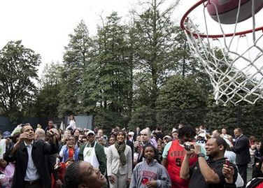 President Barack Obama took some time away from the traditional White House Easter Egg Roll to throw a few basketball hoops with the Easter Monday crowd on the White House grounds on April 13, 2009. 