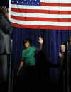 First Lady Michelle Obama waves after speaking at the Department of Homeland Security