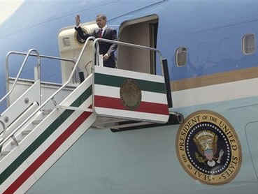 President Barack Obama in Air Force One lands at Benito Juarez International Airport in Mexico City on April 16, 2009.