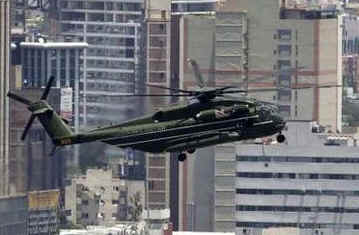 President Obama is transported to Campo de Mart Military Field via Marine One to join Mexican President Calderon.