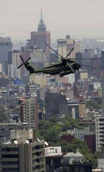 President Obama is transported to Campo de Mart Military Field via Marine One to join Mexican President Calderon.