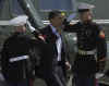 President Barack Obama leaves the Oval Office of the White House to board Marine One.