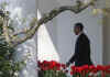 President Barack Obama leaves the Oval Office of the White House to board Marine One.