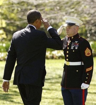 President Barack Obama leaves the Oval Office of the White House to board Marine One.