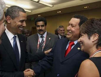 President Obama talks with Venezuelan President Hugo Chavez.