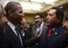 President Obama talks with Venezuelan President Hugo Chavez.