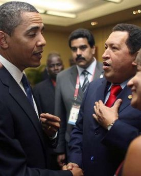 President Obama talks with Venezuelan President Hugo Chavez.