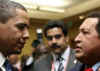 President Obama talks with Venezuelan President Hugo Chavez.