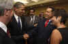 President Obama talks with Venezuelan President Hugo Chavez.