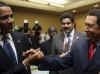 President Obama talks with Venezuelan President Hugo Chavez.