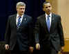 President Barack Obama arrives with Canadian Prime Minister Stephen Harper on the second day of the 5th Summit.