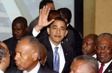 President Barack Obama greets other summit leaders prior to the official photo of the Heads of State.