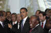 President Barack Obama greets other summit leaders prior to the official photo of the Heads of State.