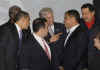 President Barack Obama greets other summit leaders prior to the official photo of the Heads of State.