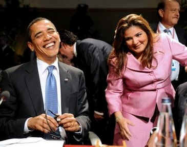 President Barack Obama laughs with El Salvador's Foreign Minister Arguetta at the First Plenary Session of the 5th Summit of the Americas.