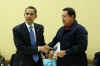 President Obama is given a book prior to the start of the meeting by Venezuelan President Hugo Chavez. The book written in Spanish is titled The Open Veins of Latin America.