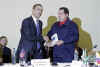 President Obama is given a book prior to the start of the meeting by Venezuelan President Hugo Chavez. The book written in Spanish is titled The Open Veins of Latin America.