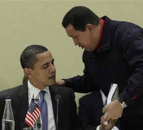 President Obama is given a book prior to the start of the meeting by Venezuelan President Hugo Chavez. The book written in Spanish is titled The Open Veins of Latin America.