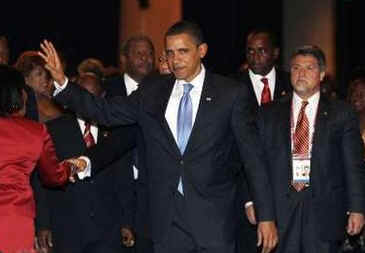 President Barack Obama arrives at the Official Dinner of the Summit of the Americas in Port of Spain, Trinidad and Tobago.