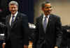 President Barack Obama arrives with Canadian Prime Minister Stephen Harper on the second day of the 5th Summit.