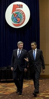 President Barack Obama arrives with Canadian Prime Minister Stephen Harper on the second day of the 5th Summit.