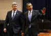 President Barack Obama arrives with Canadian Prime Minister Stephen Harper on the second day of the 5th Summit.