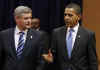 President Barack Obama arrives with Canadian Prime Minister Stephen Harper on the second day of the 5th Summit.